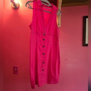 Form fitting pink mini dress.